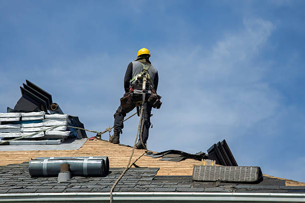 Professional Roofing technician working in Ford, WA